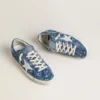 Super-Star LTD pour femme en denim bleu clair avec une étoile en cuir blanc et des fleurs brodées
