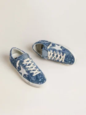 Super-Star LTD pour femme en denim bleu clair avec une étoile en cuir blanc et des fleurs brodées