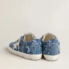 Super-Star LTD pour femme en denim bleu clair avec une étoile en cuir blanc et des fleurs brodées