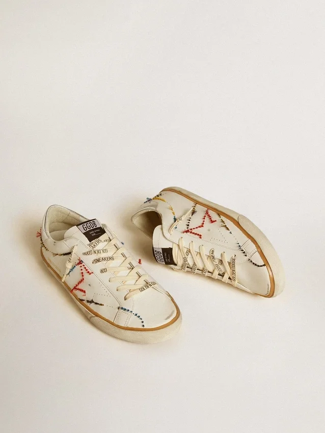 Super-Star LTD pour homme avec étoile perforée et languette de talon en cuir métallisé