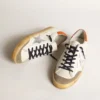 Super-Star Penstar avec étoile argentée et languette de talon orange