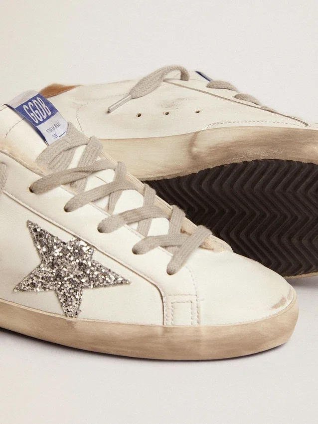 Super-Star pour femme avec doublure en peau de mouton et étoile pailletée argentée