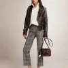 Super-Star pour femme avec languette de talon argentée et lettrage à clous métalliques