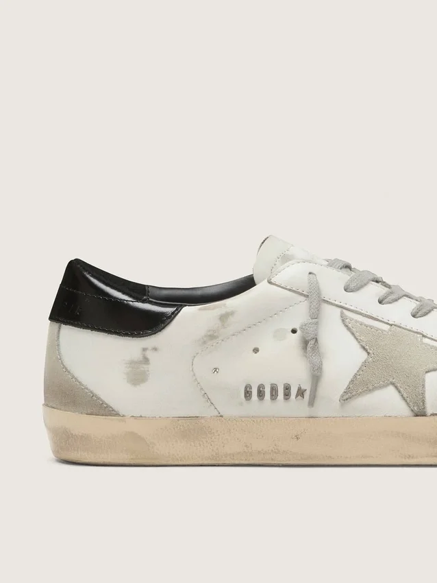 Super-Star pour homme avec languette de talon noire et lettrage à clous métalliques