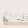 Super-Star pour femme avec étoile en cuir argenté et languette de talon rose