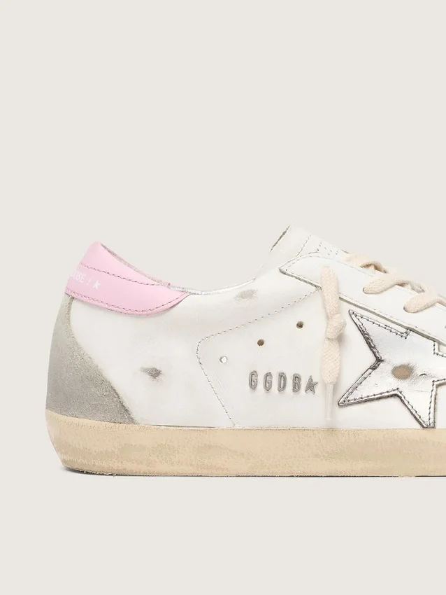 Super-Star pour femme avec étoile en cuir argenté et languette de talon rose