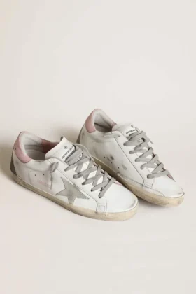 Super-Star pour femme avec étoile en daim gris et languette de talon en cuir rose