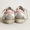 Super-Star pour femme avec étoile en daim gris et languette de talon en cuir rose