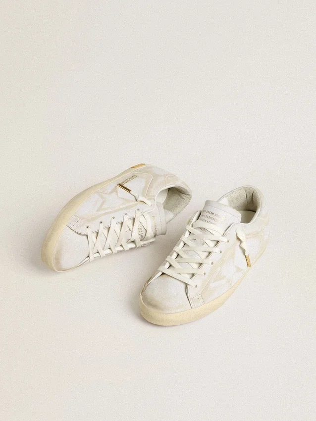 Super-Star pour femme avec étoile et languette de talon en cuir blanc à l’effet usé