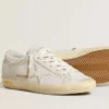 Super-Star pour femme avec étoile et languette de talon en cuir blanc à l’effet usé