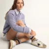 Super-Star pour femme avec étoile pailletée noire et languette de talon rose