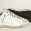 Super-Star pour femme en cuir blanc avec étoile perforée et languette de talon en nubuck beige