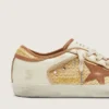 Super-Star pour femme en cuir blanc et raphia, avec étoile et empiècements rouge brique