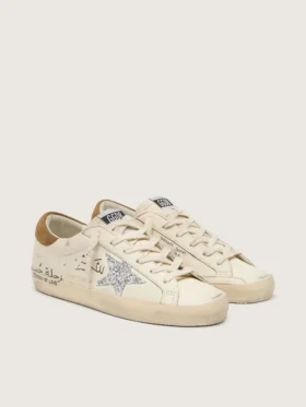 Super-Star pour femme en cuir nappa avec étoile pailletée argentée et lettrage sur toute la surface