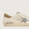 Super-Star pour femme en cuir nappa avec étoile pailletée argentée et lettrage sur toute la surface