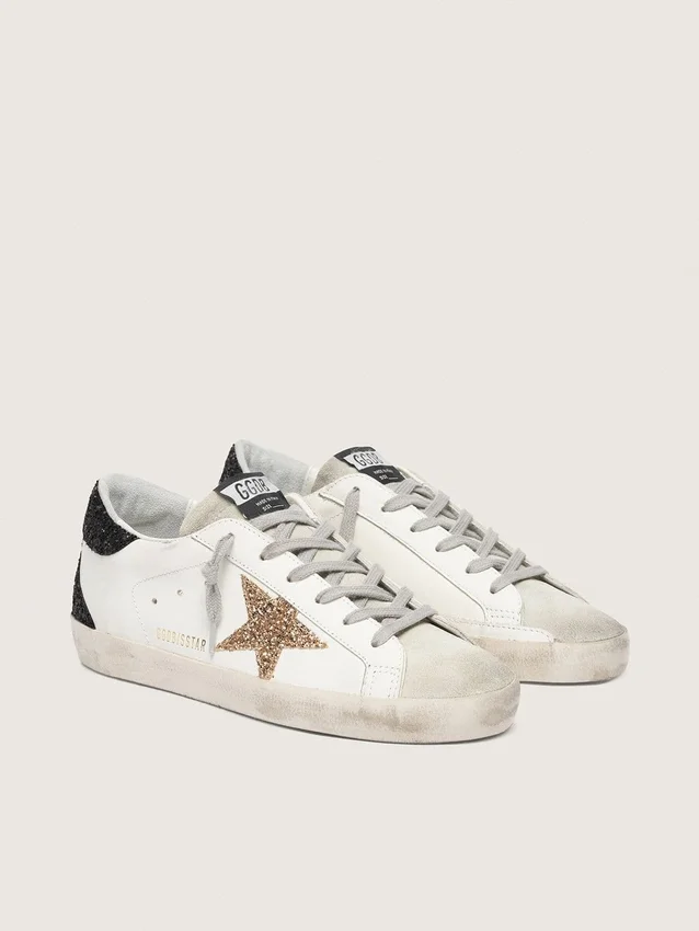 Super-Star pour femme en cuir nappa avec étoile pailletée dorée et languette de talon pailletée noire