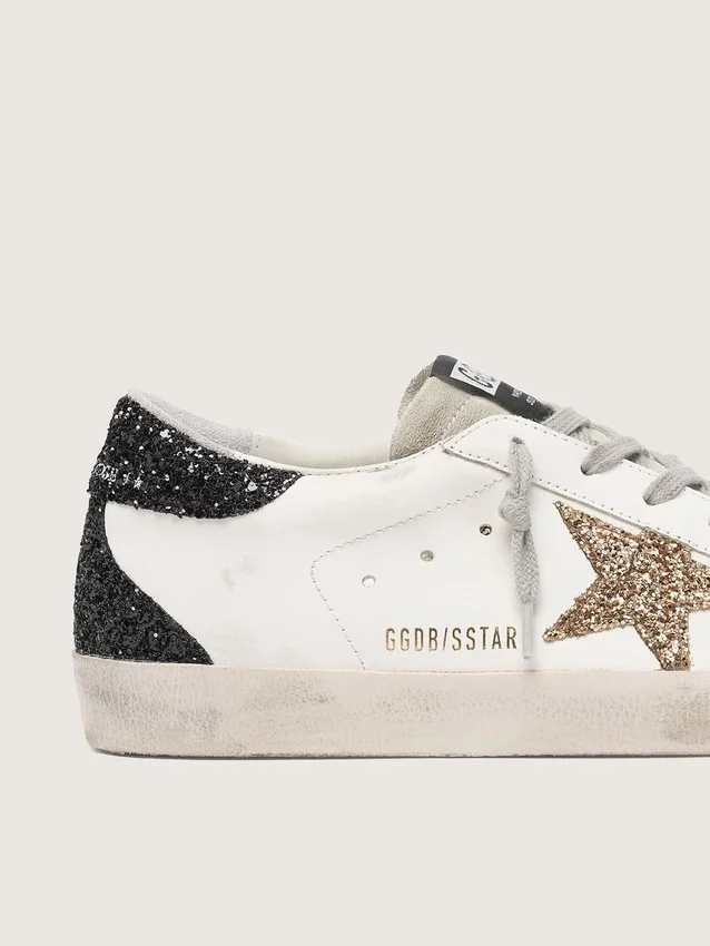 Super-Star pour femme en cuir nappa avec étoile pailletée dorée et languette de talon pailletée noire