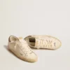 Super-Star pour femme en cuir nappa avec étoile perforée et languette de talon en daim