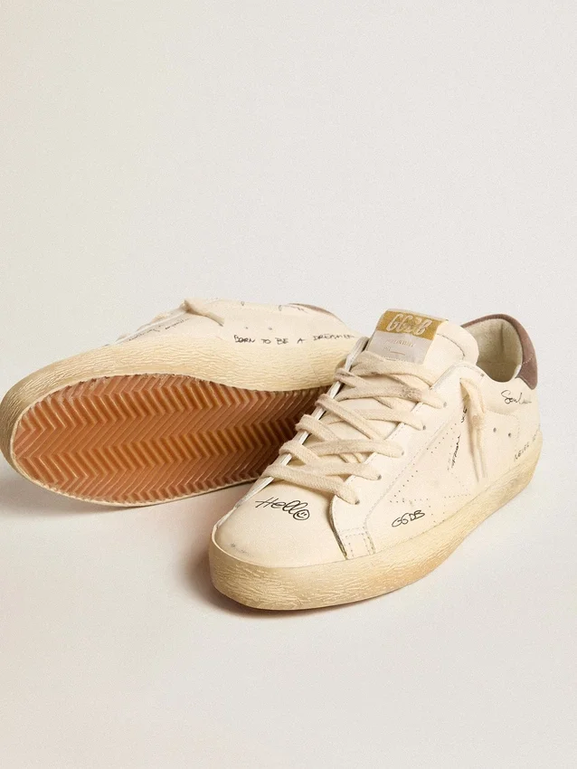 Super-Star pour femme en cuir nappa avec étoile perforée et languette de talon en daim