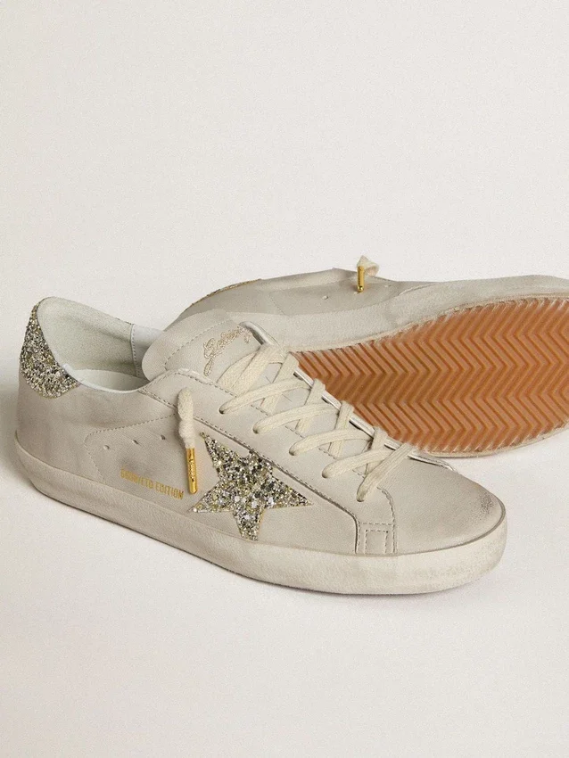 Super-Star pour femme en cuir nappa ivoire avec étoile pailletée platine et languette au talon
