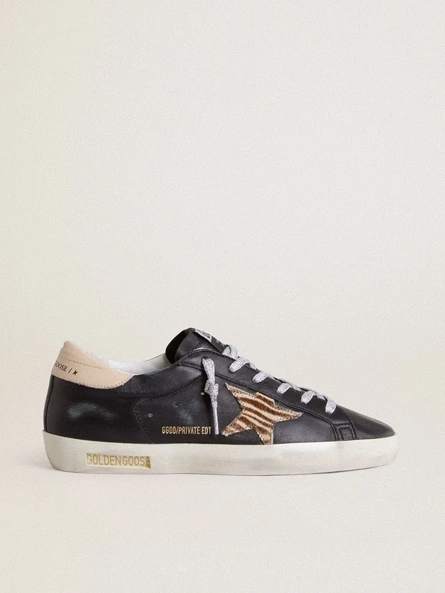 Super-Star pour femme en cuir nappa noir avec étoile en cuir de poney à imprimé zèbre et languette de talon en cuir beige