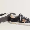 Super-Star pour femme en cuir nappa noir avec étoile en cuir de poney à imprimé zèbre et languette de talon en cuir beige