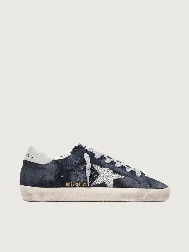 Super-Star pour femme en daim bleu avec étoile pailletée argentée et languette de talon en cuir