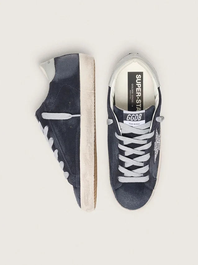 Super-Star pour femme en daim bleu avec étoile pailletée argentée et languette de talon en cuir