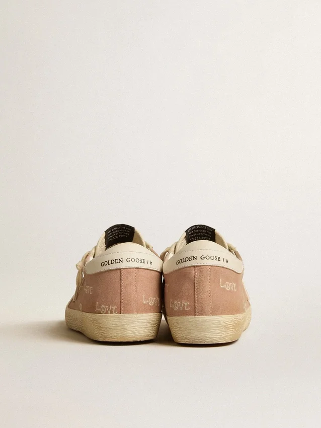 Super-Star pour femme en daim rose poudré avec étoile en cuir crème