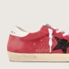 Super-Star pour femme en daim rouge avec étoile pailletée et languette de talon blanche