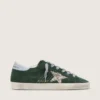 Super-Star pour femme en daim vert, avec étoile pailletée argentée et languette de talon en cuir