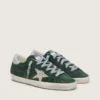 Super-Star pour femme en daim vert, avec étoile pailletée argentée et languette de talon en cuir