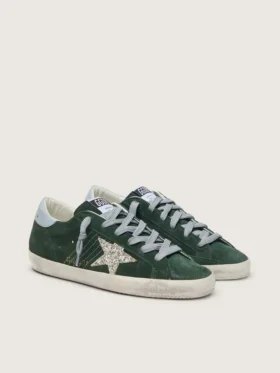 Super-Star pour femme en daim vert, avec étoile pailletée argentée et languette de talon en cuir