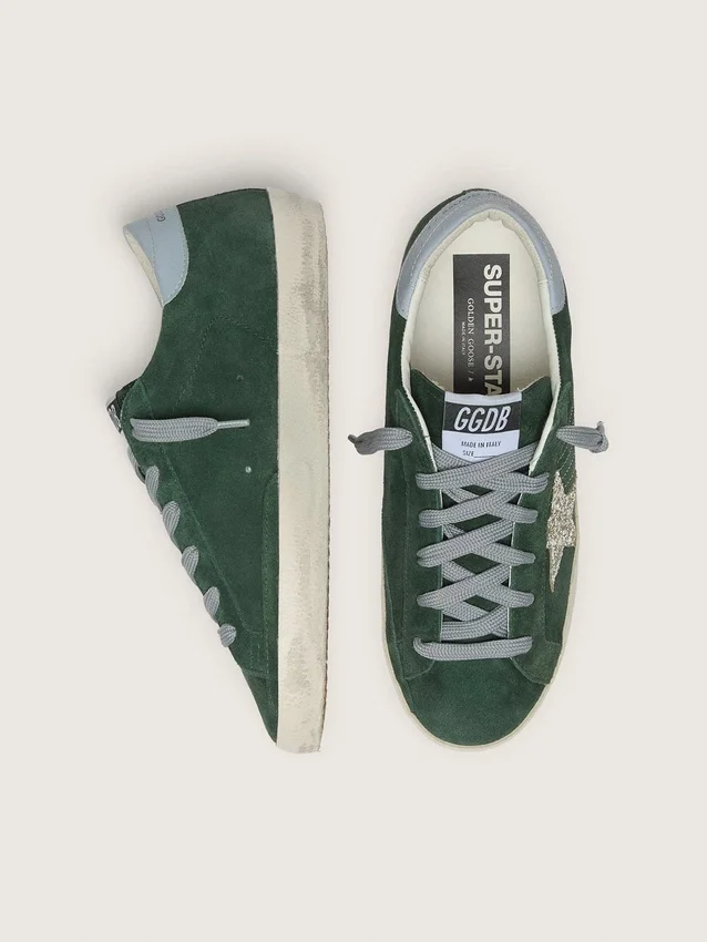 Super-Star pour femme en daim vert, avec étoile pailletée argentée et languette de talon en cuir