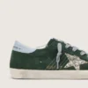Super-Star pour femme en daim vert, avec étoile pailletée argentée et languette de talon en cuir