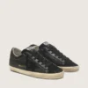 Super-Star pour femme en nappa noir avec étoile noire et languette de talon pailletée
