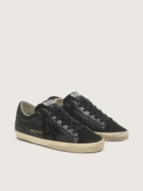 Super-Star pour femme en nappa noir avec étoile noire et languette de talon pailletée