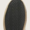 Super-Star pour femme en nappa noir avec étoile noire et languette de talon pailletée