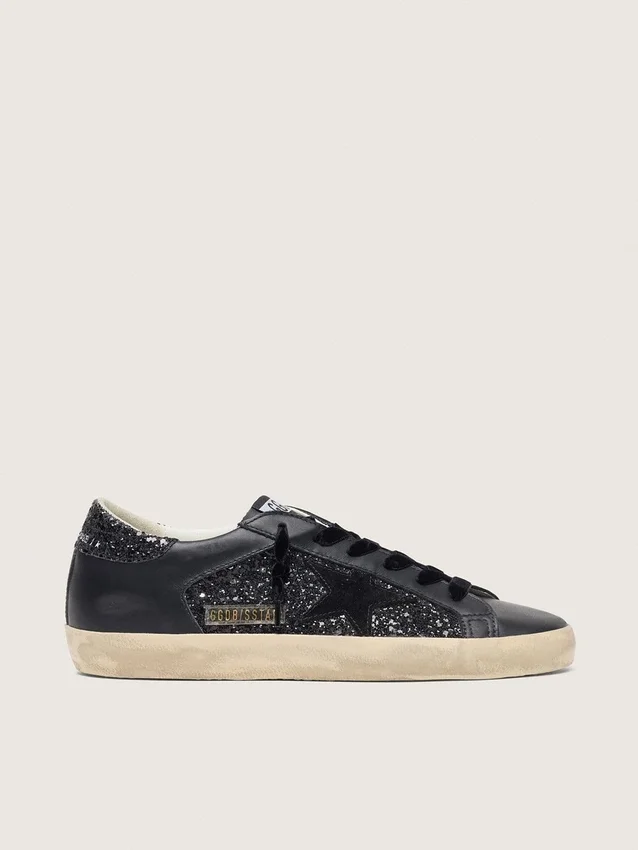 Super-Star pour femme en paillettes noires avec étoile en daim noir et empiècements en cuir