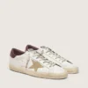Super-Star pour homme avec étoile en daim couleur sable et languette de talon en cuir à imprimé croco rouge