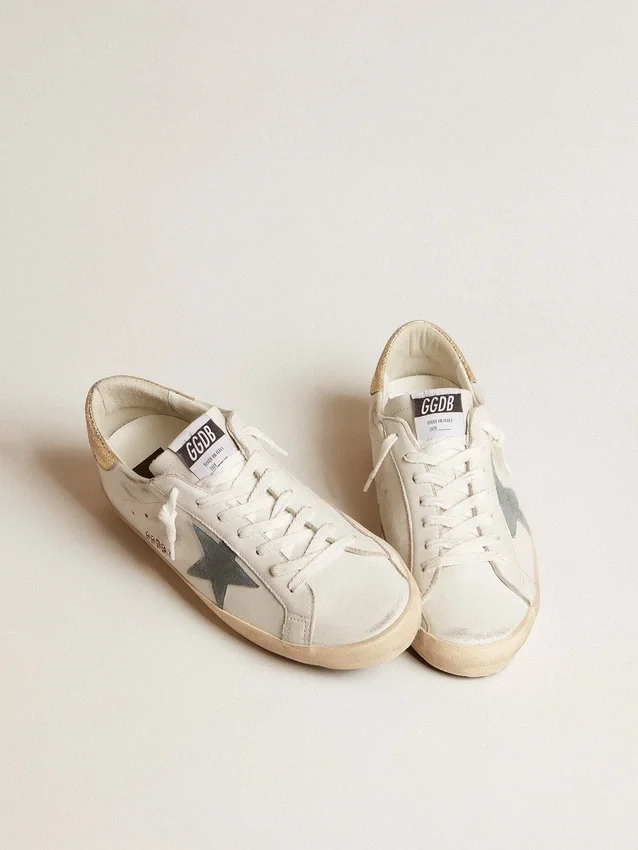 Super-Star pour homme avec étoile en daim et languette de talon en cuir imprimé serpent platine