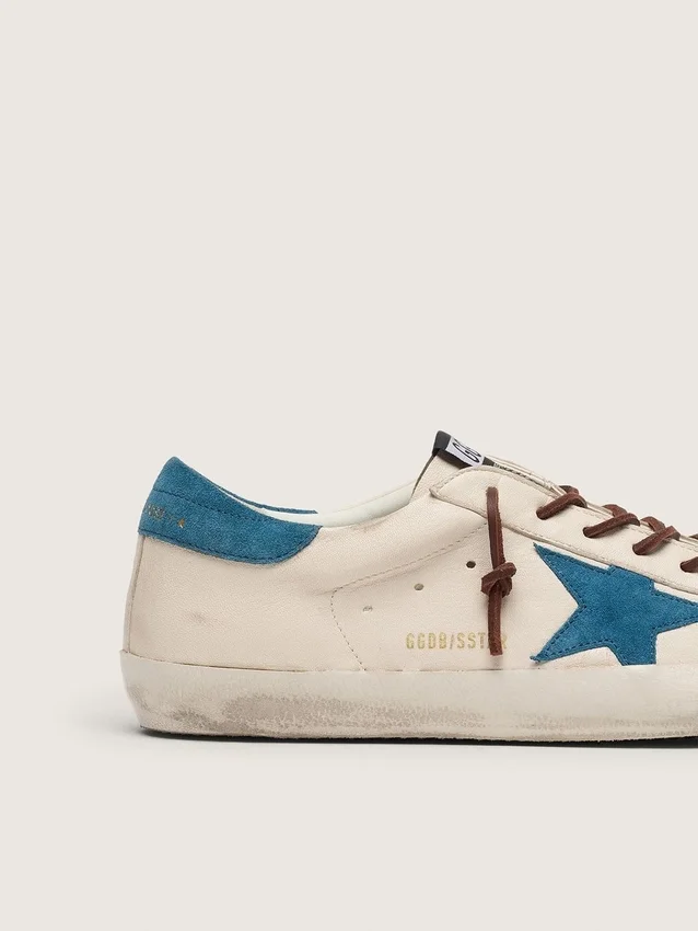 Super-Star pour homme en cuir blanc avec étoile en daim turquoise