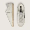 Super-Star pour homme en cuir blanc avec étoile en nubuck noir et languette de talon en cuir métallisé argenté