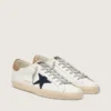 Super-Star pour homme en cuir blanc avec étoile en toile bleu nuit et languette de talon en cuir tabac