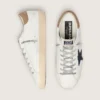 Super-Star pour homme en cuir blanc avec étoile en toile bleu nuit et languette de talon en cuir tabac