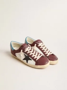 Super-Star pour homme en cuir craquelé avec étoile marron et languette de talon bleu sarcelle