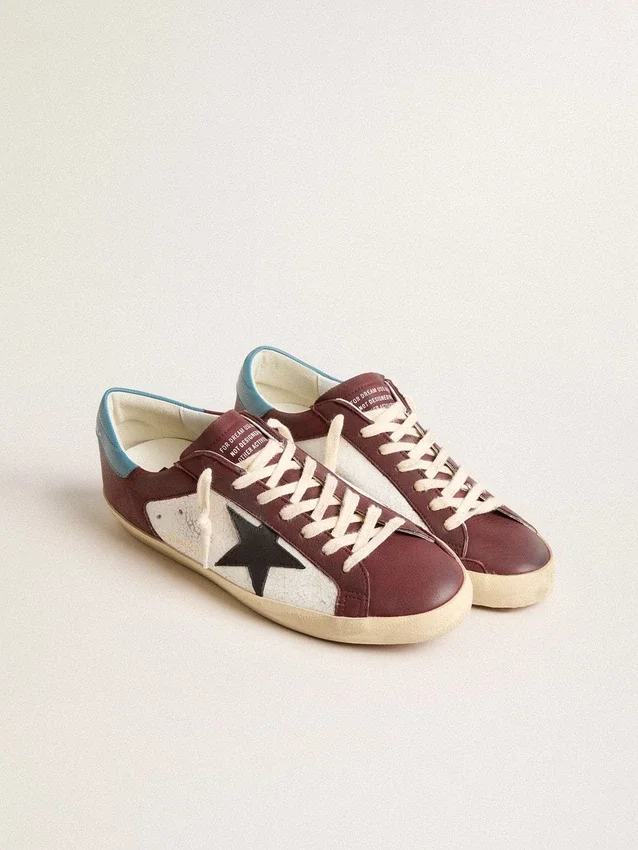 Super-Star pour homme en cuir craquelé avec étoile marron et languette de talon bleu sarcelle