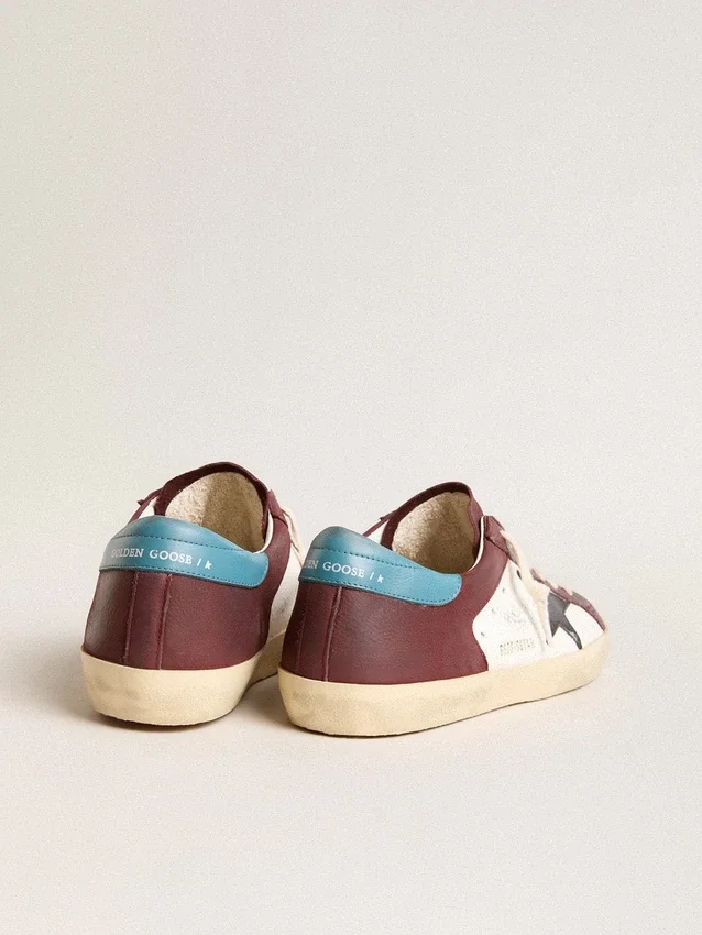 Super-Star pour homme en cuir craquelé avec étoile marron et languette de talon bleu sarcelle