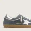Super-Star pour homme en daim gris avec étoile en cuir blanc et languette de talon en cuir argenté