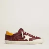 Super-Star pour homme en daim rouge brique avec étoile en cuir blanc et languette au talon à imprimé animalier